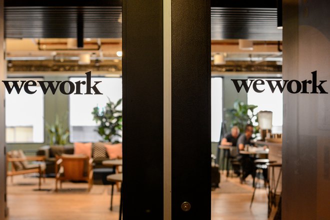 WeWork logos are seen at a WeWork office in San Francisco, California, U.S. September 30, 2019.  REUTERS/Kate Munsch