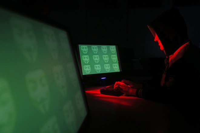 računalničar, heker, kriminal, kibernetski kriminal, kibernetični kriminal Foto Reuters Reuters