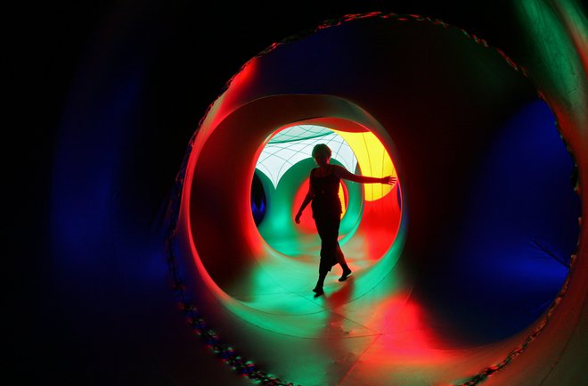 Festival-goers relax inside the 3-D Luminarium inflatable installation by British designer Alain Parkinson during Budapest's one-week, round-the-clock Sziget ('Island') music festival on an island in the Danube river August 10, 2005. The open-air festival