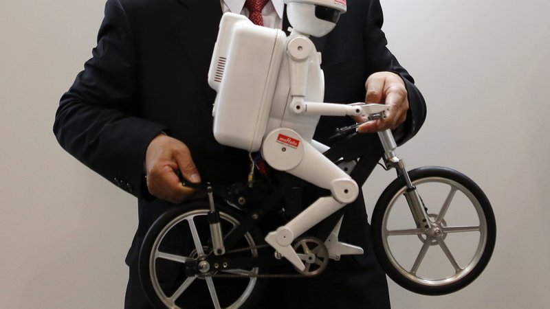 Fotografija: Pa vi, bi vi zamenjali svojega šefa z robotom? Foto: Reuters