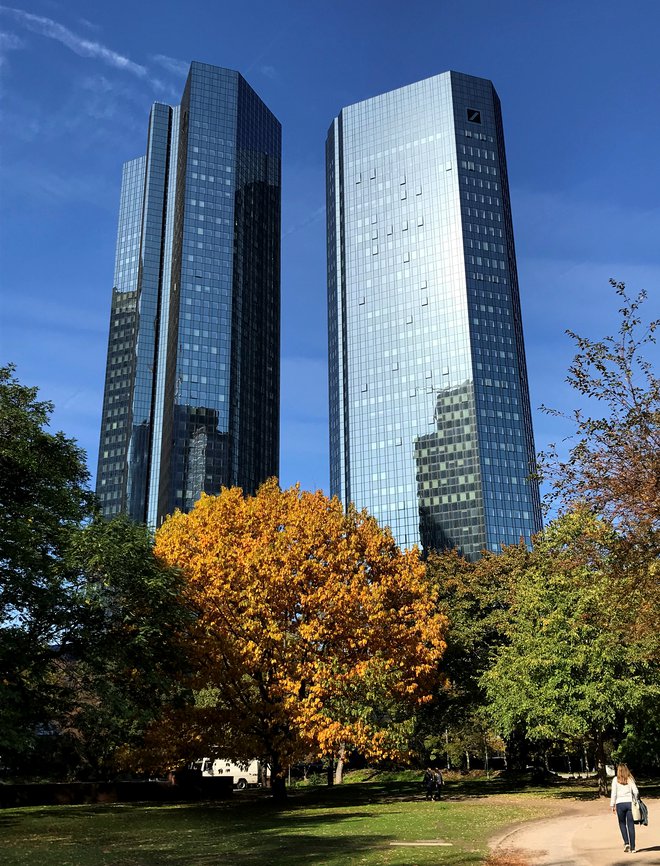 People walk in a park near Deutsche Bank headquarters in Frankfurt, Germany, October 14, 2019. Picture taken October 14, 2019.     REUTERS/Sabine Wollrab - RC13B6A977A0