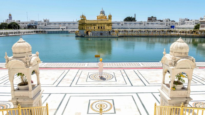Fotografija: Zlati tempelj v Armistaru v Indiji, Foto: Narinder Nanu/AFP
