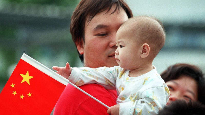 Fotografija: Peking je uvedel politiko treh otrok. Foto: Thomas Cheng / AFP
