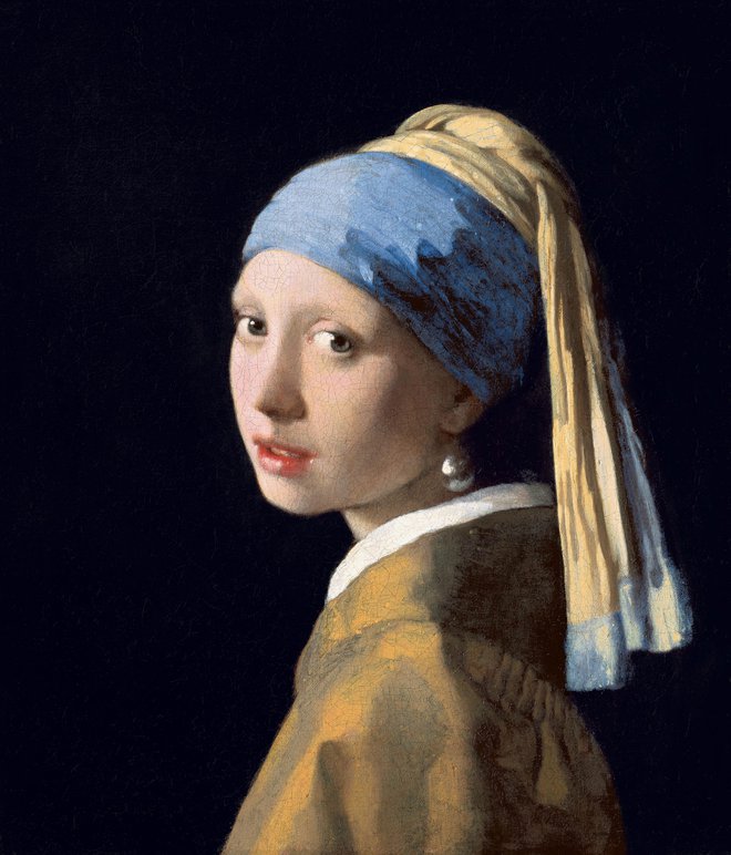 Dekle z bisernim uhanom Johannesa Vermeerja nekateri imenujejo tudi najlepša slika na svetu. Foto: Wikipedia
