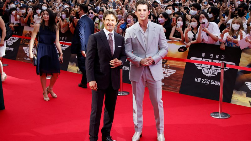 Fotografija: Igralca Tom Cruise in Miles Teller na promociji Top Gun: Maverick v Južni Koreji, 19. junija 2022. Foto: Heo Ran/Reuters
