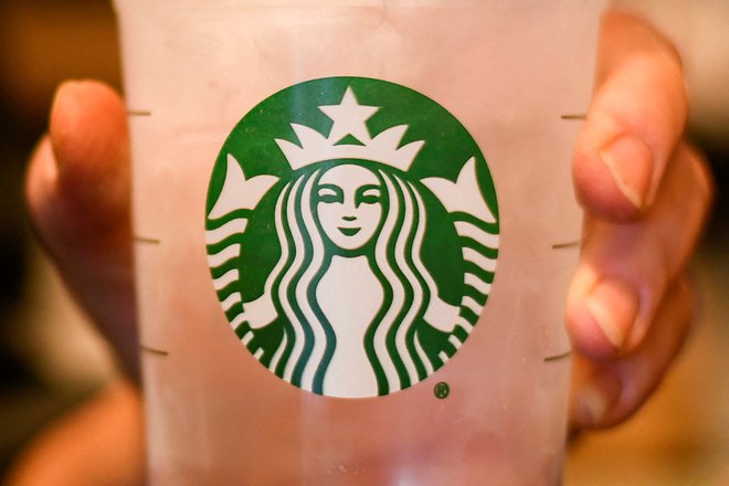Starbucks je v zadnjem četrtletju poročal o rekordnem številu strank FOTO: Reuters
