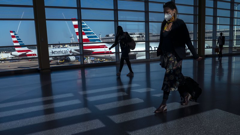 Fotografija: Stroški poslovnih potovanj, predvsem letalske vozovnice, se bodo do leta 2023 močno povečali. Foto: Nathan Howard/AFP
